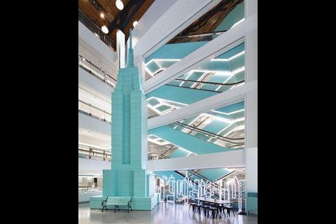 Blue Empire State Building statue in Tiffany Next Door store in New York